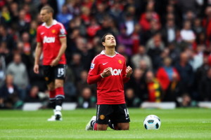 BLACKBURN, ENGLAND - MAY 14: Javier Hernandez of Manchester United kneels in prayer prior to the Barclays Premier League match between Blackburn Rovers and Manchester United at Ewood park on May 14, 2011 in Blackburn, England. (Photo by Dean Mouhtaropoulos/Getty Images)